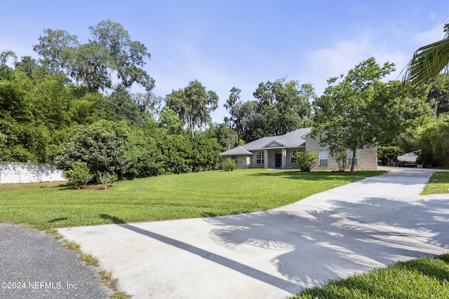 view of front of house with a front lawn