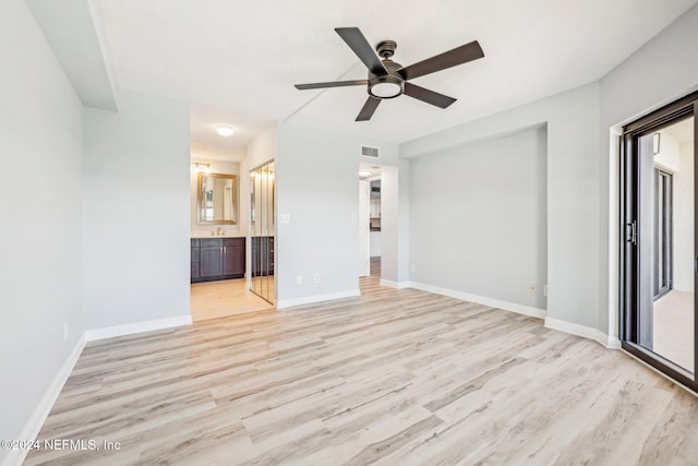 interior space featuring light wood-type flooring and ceiling fan