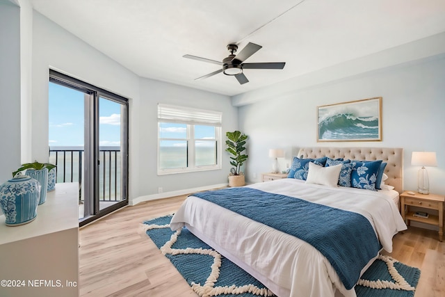 bedroom with ceiling fan, light hardwood / wood-style floors, and access to exterior