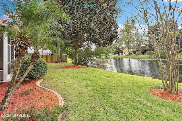 view of yard with a water view