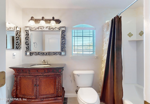 full bathroom featuring tile patterned flooring, vanity, shower / bath combo, and toilet