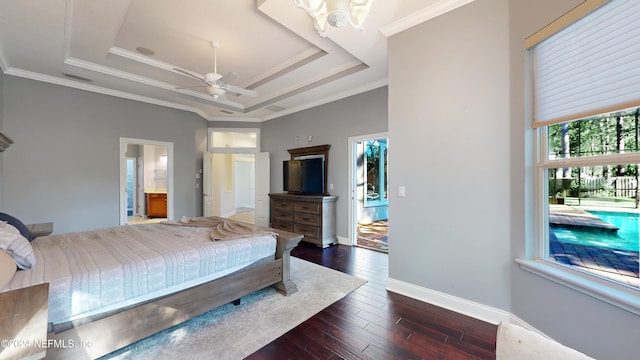 bedroom featuring ceiling fan with notable chandelier, a raised ceiling, dark wood-type flooring, and crown molding