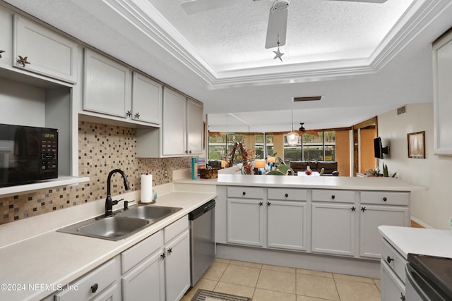 kitchen with a textured ceiling, sink, kitchen peninsula, stainless steel dishwasher, and crown molding