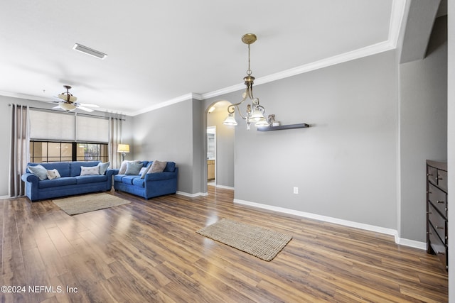 living room with crown molding, wood-type flooring, and ceiling fan with notable chandelier