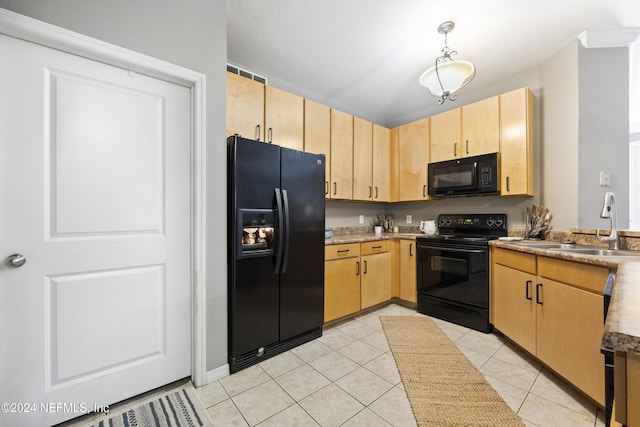 kitchen featuring pendant lighting, black appliances, sink, light tile patterned floors, and light brown cabinetry