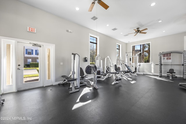 exercise room featuring ceiling fan and a healthy amount of sunlight