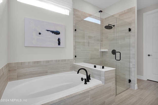 bathroom with independent shower and bath