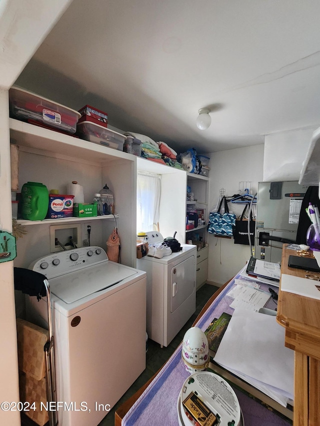 laundry room with independent washer and dryer