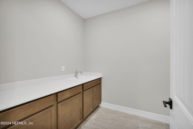 bathroom featuring tile patterned floors and vanity