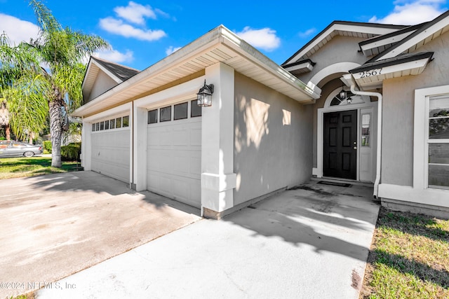 exterior space featuring a garage