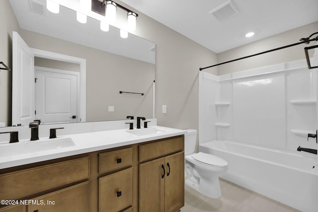 full bathroom with shower / bathing tub combination, vanity, and toilet