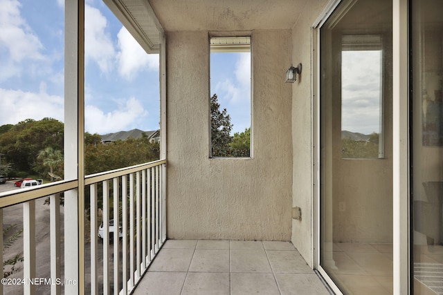 balcony featuring a mountain view