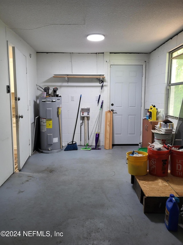 garage featuring water heater