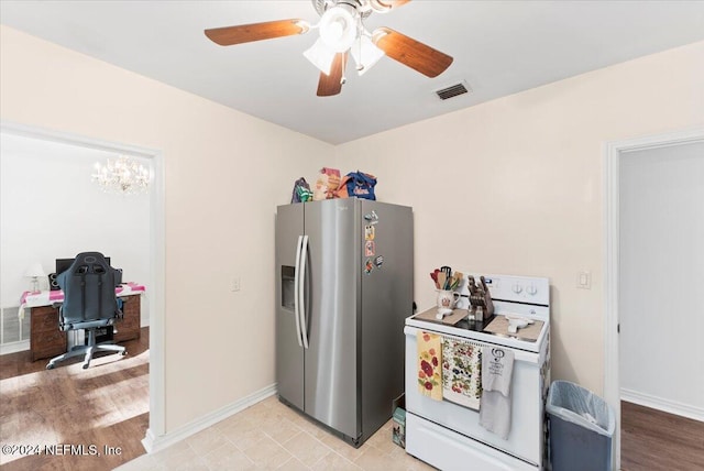 kitchen featuring a chandelier, stainless steel fridge with ice dispenser, light hardwood / wood-style floors, and electric stove