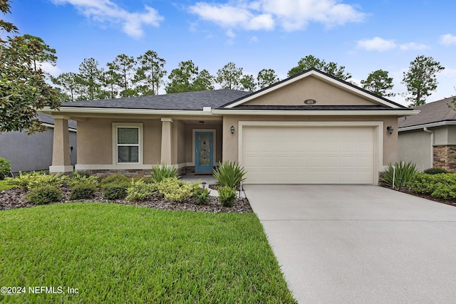 ranch-style house with a front yard and a garage