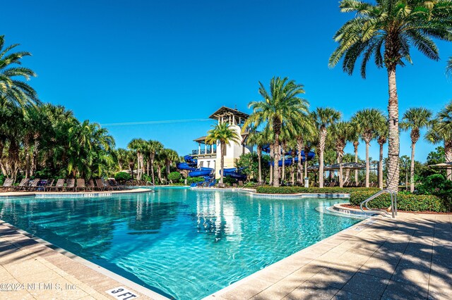 view of swimming pool featuring a patio area