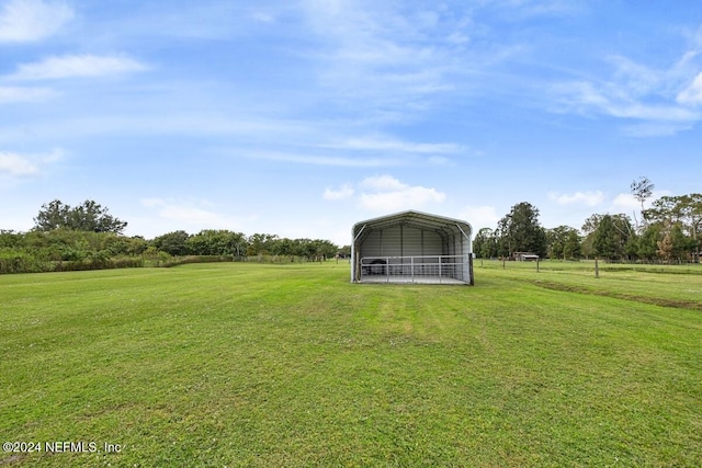 view of yard with a carport