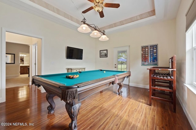 playroom featuring a raised ceiling, ceiling fan, billiards, and hardwood / wood-style flooring