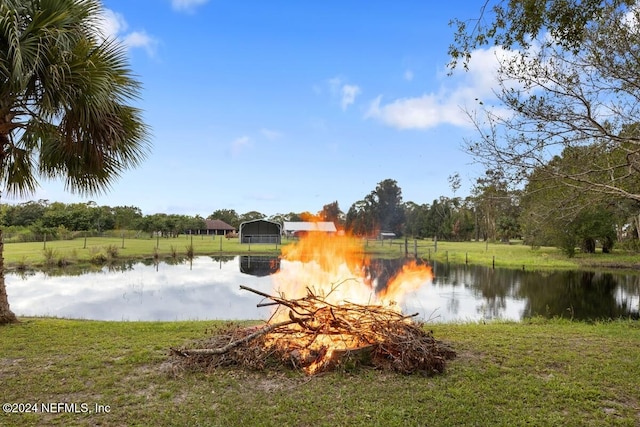 water view featuring a fire pit