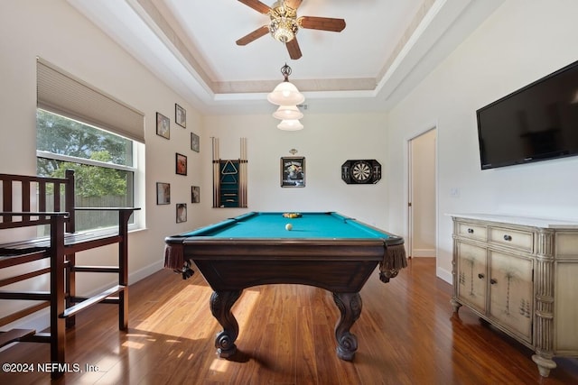 recreation room featuring a raised ceiling, ceiling fan, billiards, and hardwood / wood-style flooring