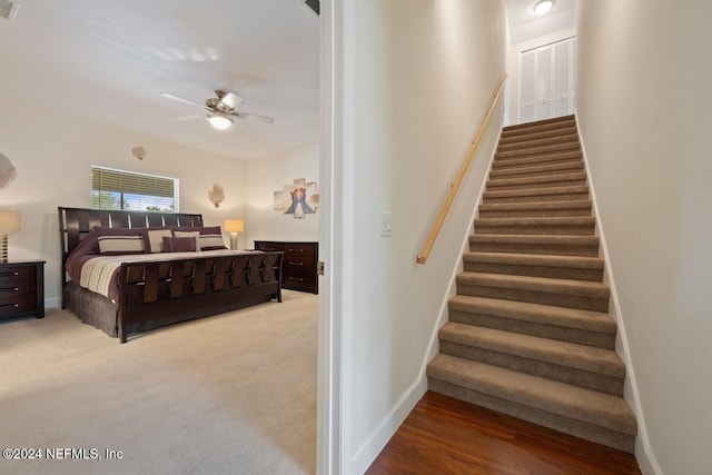 bedroom featuring ceiling fan and carpet floors