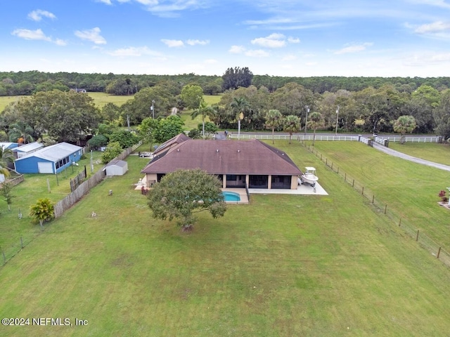 birds eye view of property featuring a rural view