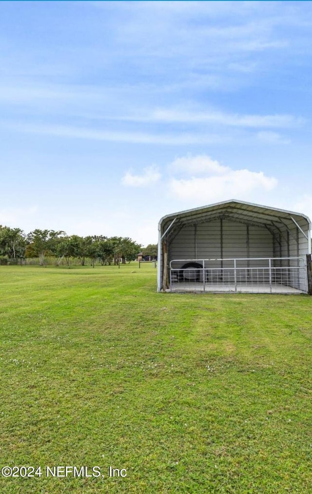 view of yard with a carport