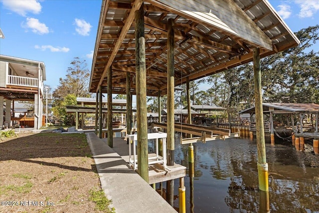 view of dock with a water view