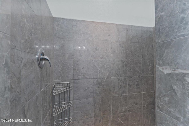 details featuring a tile shower