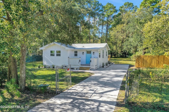 view of front of house with a front lawn