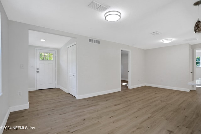 foyer with hardwood / wood-style floors