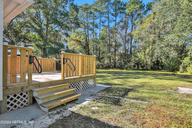 view of yard with a deck