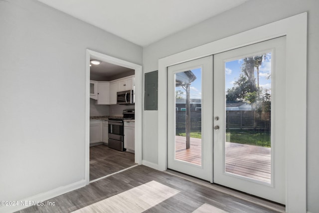 entryway featuring french doors and light hardwood / wood-style floors