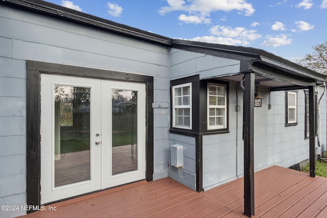 wooden deck featuring french doors