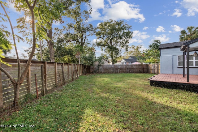 view of yard featuring a deck