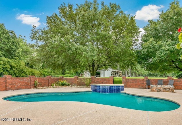 7436 Woodlawn Rd, Macclenny, FL 32063 - view of swimming pool with a patio area