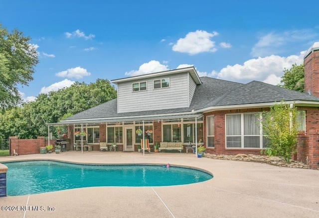 7436 Woodlawn Rd, Macclenny, FL 32063 - view of swimming pool with an outdoor living space and a patio