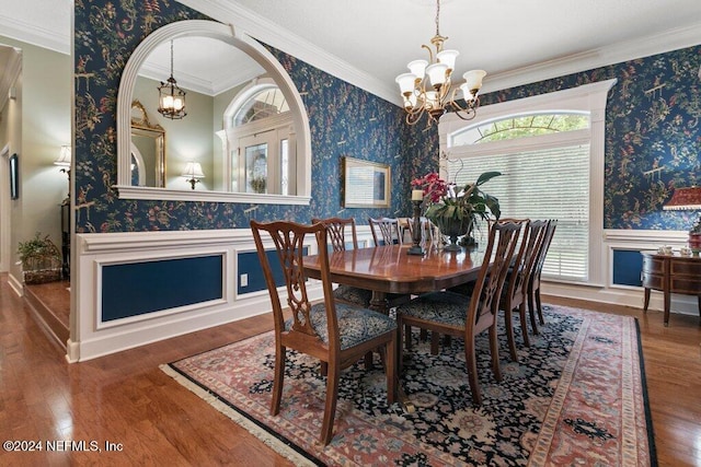 7436 Woodlawn Rd, Macclenny, FL 32063 - dining space featuring hardwood / wood-style floors, an inviting chandelier, and ornamental molding