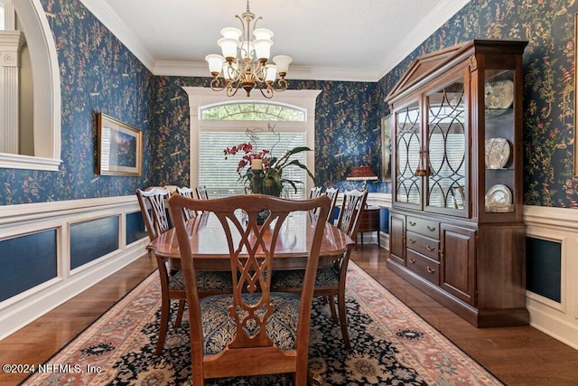 7436 Woodlawn Rd, Macclenny, FL 32063 - dining area featuring ornamental molding, an inviting chandelier, and dark wood-type flooring
