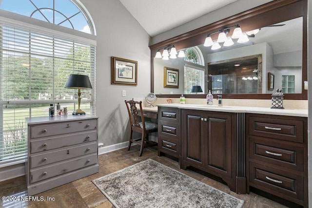 7436 Woodlawn Rd, Macclenny, FL 32063 - bathroom featuring vanity, walk in shower, and vaulted ceiling