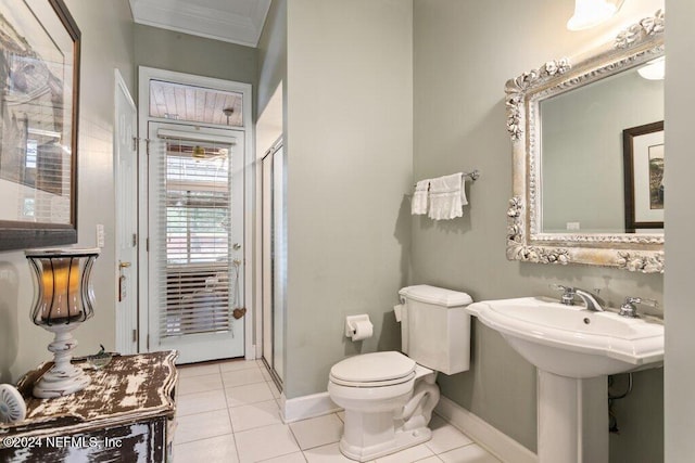 7436 Woodlawn Rd, Macclenny, FL 32063 - bathroom featuring tile patterned floors, toilet, and crown molding