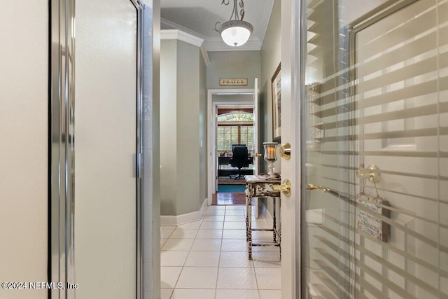 7436 Woodlawn Rd, Macclenny, FL 32063 - corridor featuring light tile patterned floors and crown molding