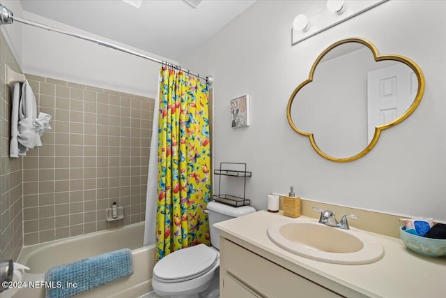 full bathroom with vanity, toilet, and shower / bathtub combination with curtain