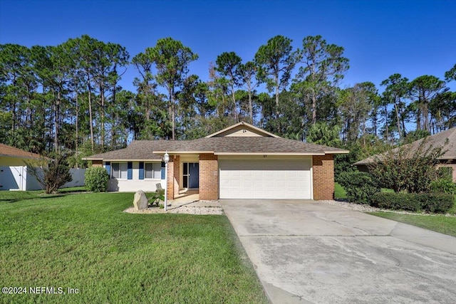 ranch-style home with a garage and a front lawn