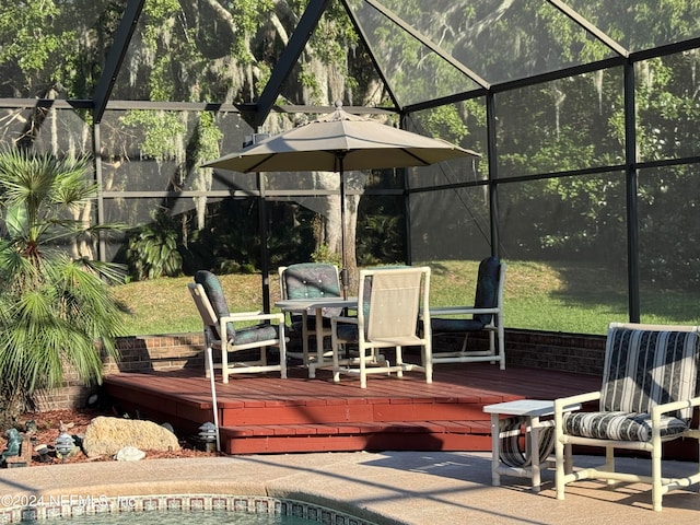 view of patio with a lanai and a swimming pool side deck