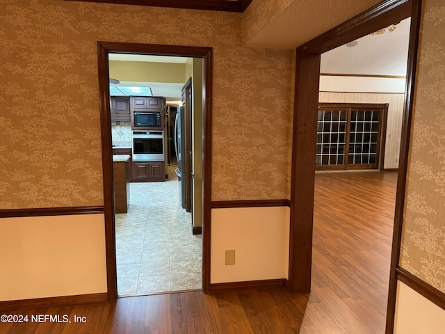 hall featuring hardwood / wood-style flooring