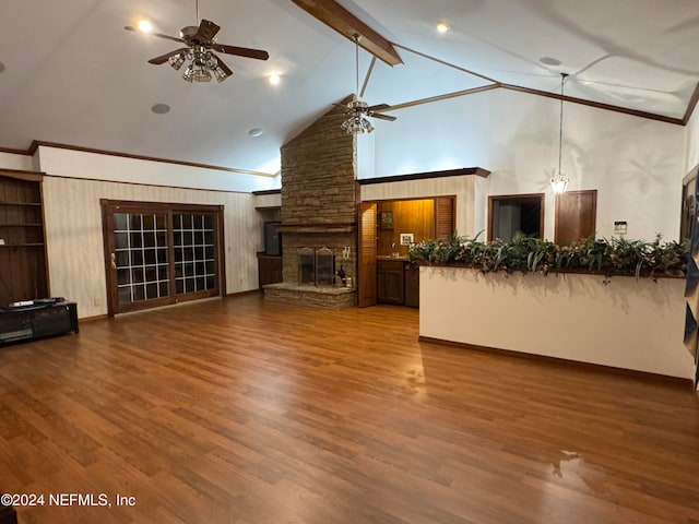 unfurnished living room with hardwood / wood-style flooring, ceiling fan, beam ceiling, and high vaulted ceiling