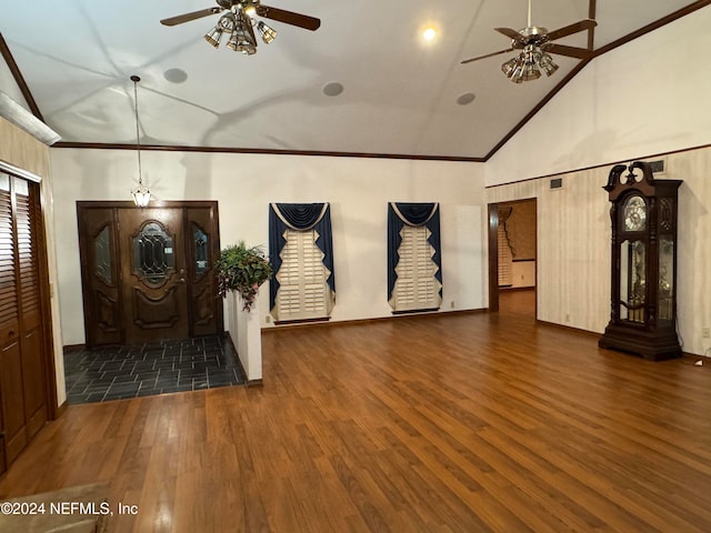 foyer featuring crown molding, high vaulted ceiling, dark hardwood / wood-style floors, and ceiling fan