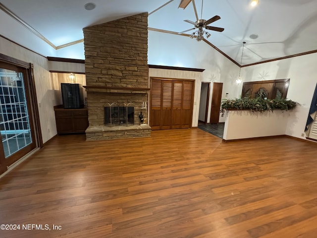 unfurnished living room with ceiling fan, a fireplace, high vaulted ceiling, and wood-type flooring