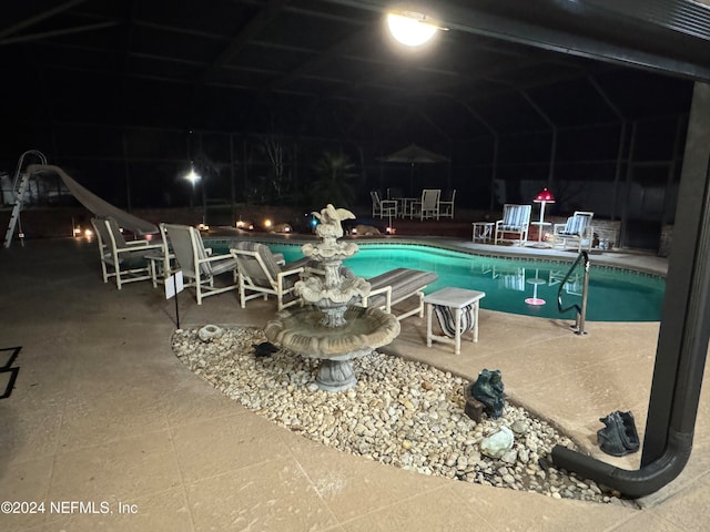 view of pool featuring a patio area